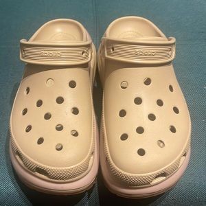 Pink and crème Crocs